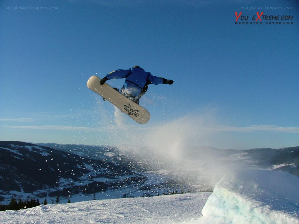 Snowboarder performing a jump
