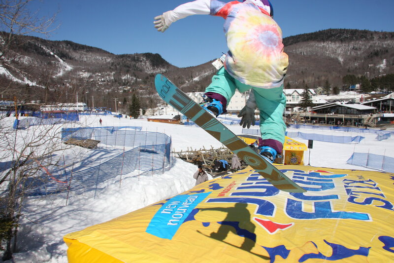 Snowboarder performing a jump