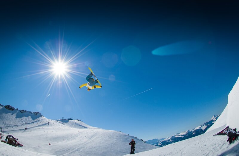 Snowboarder performing aerial trick