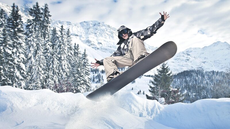 Snowboarder performing jump