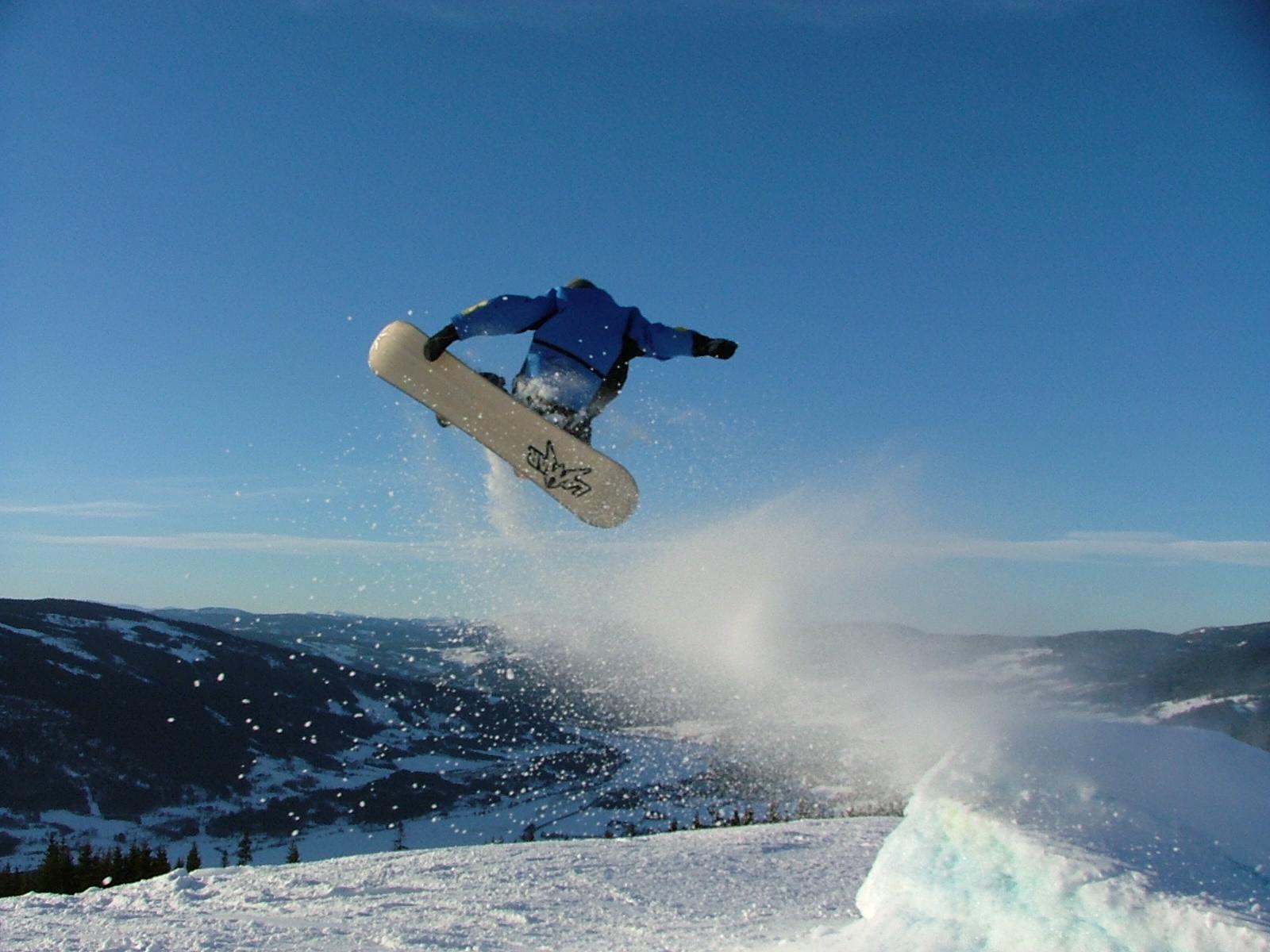 Snowboarder performing jump
