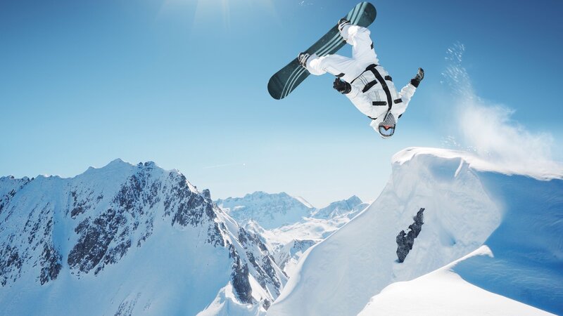 Snowboarder Performing Trick — Blue