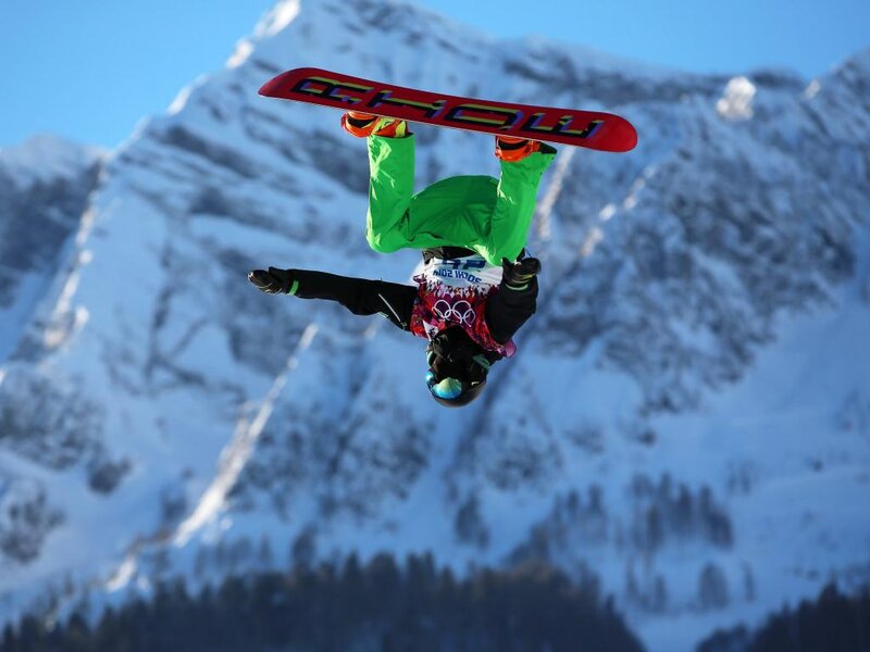 Snowboarder Performing Trick — Green