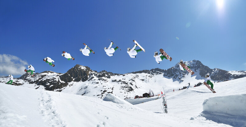 Snowboarder Performing Trick — White, Active