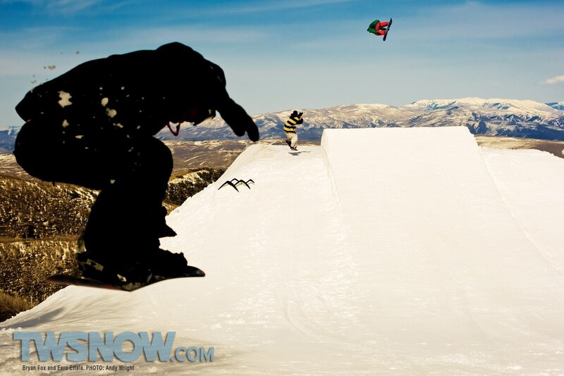 Snowboarders at a terrain park