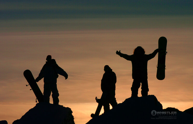 Snowboarders on Mountain
