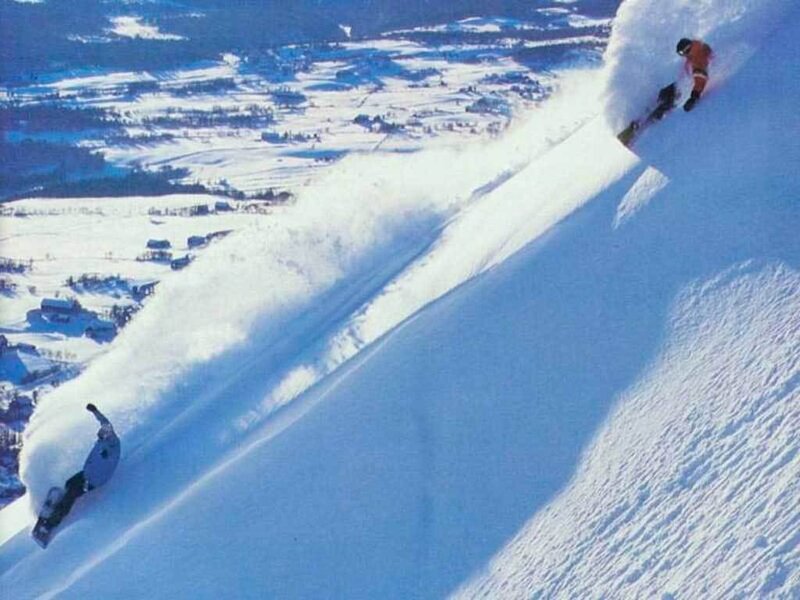Snowboarders on Slope