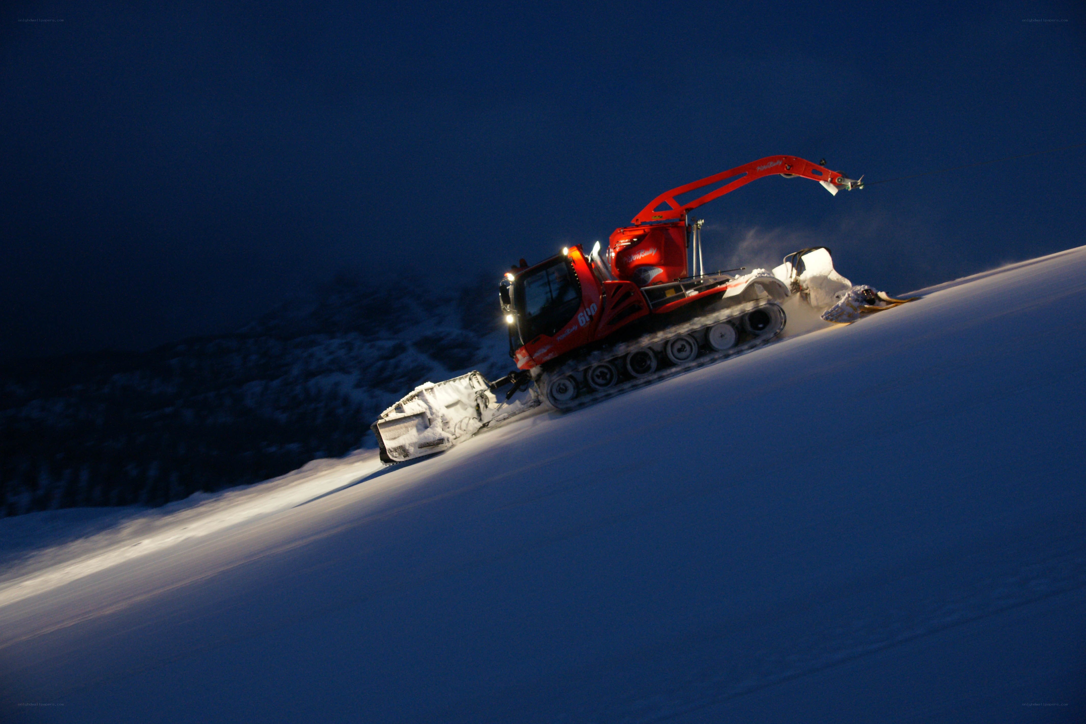 Snowcat on a snowy slope