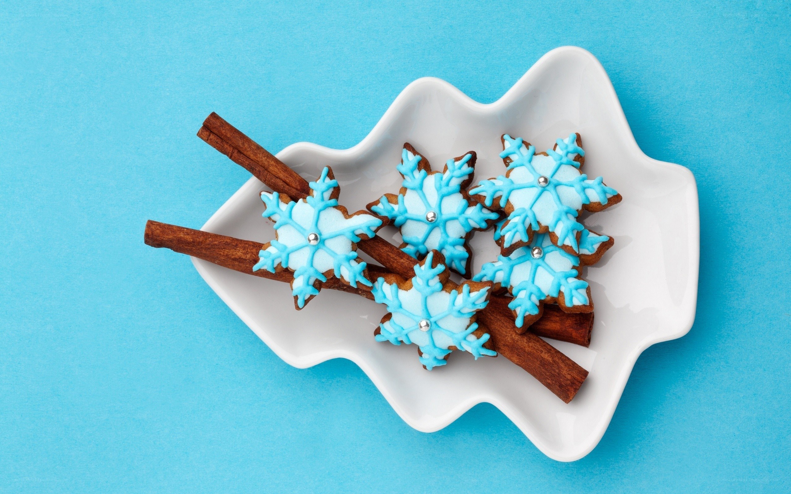 snowflake cookies on plate