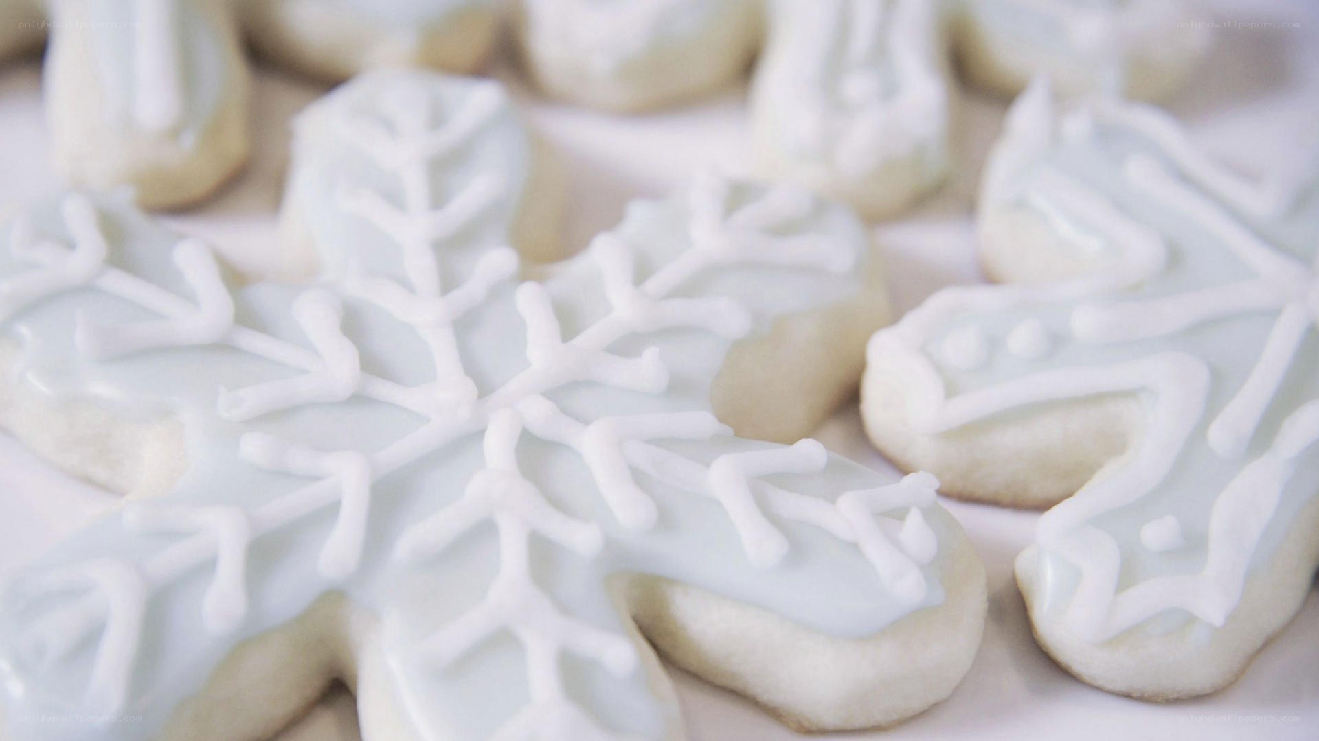snowflake cookies with white icing