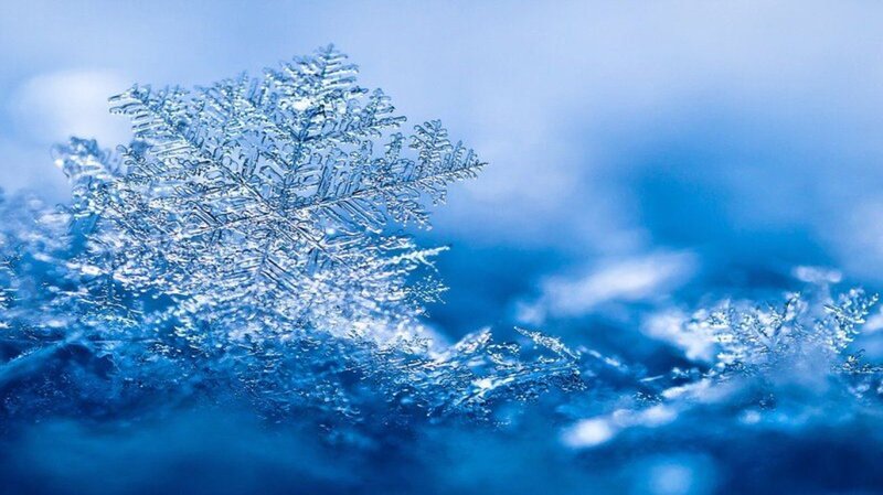 Snowflake on Blue Surface — Cold