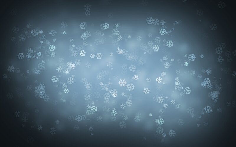 snowflakes falling in blue light