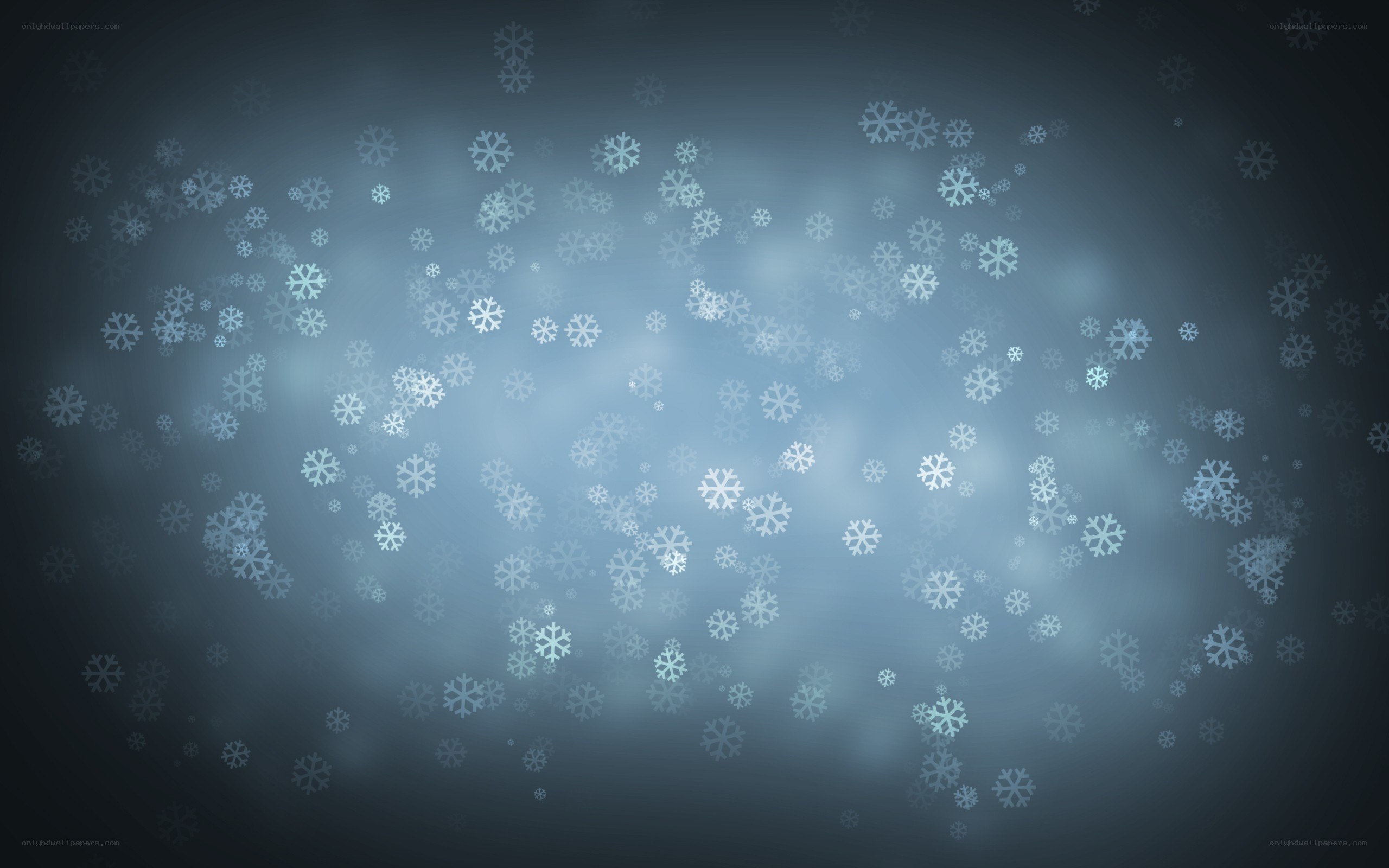 snowflakes falling in blue light