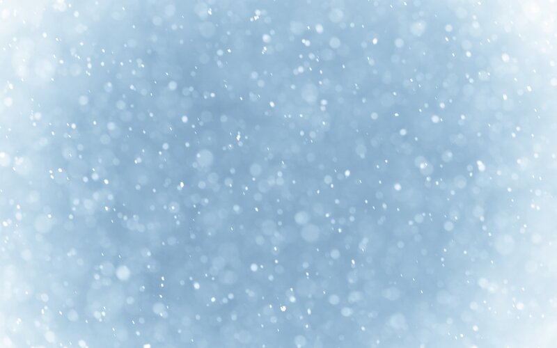 snowflakes falling in blue light