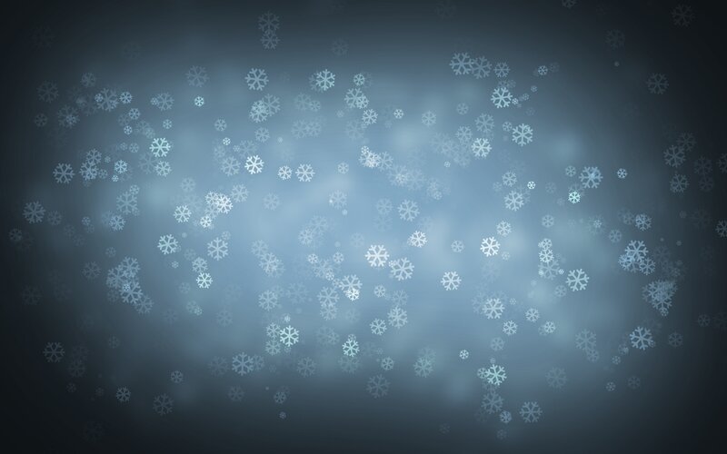 snowflakes falling in blue light