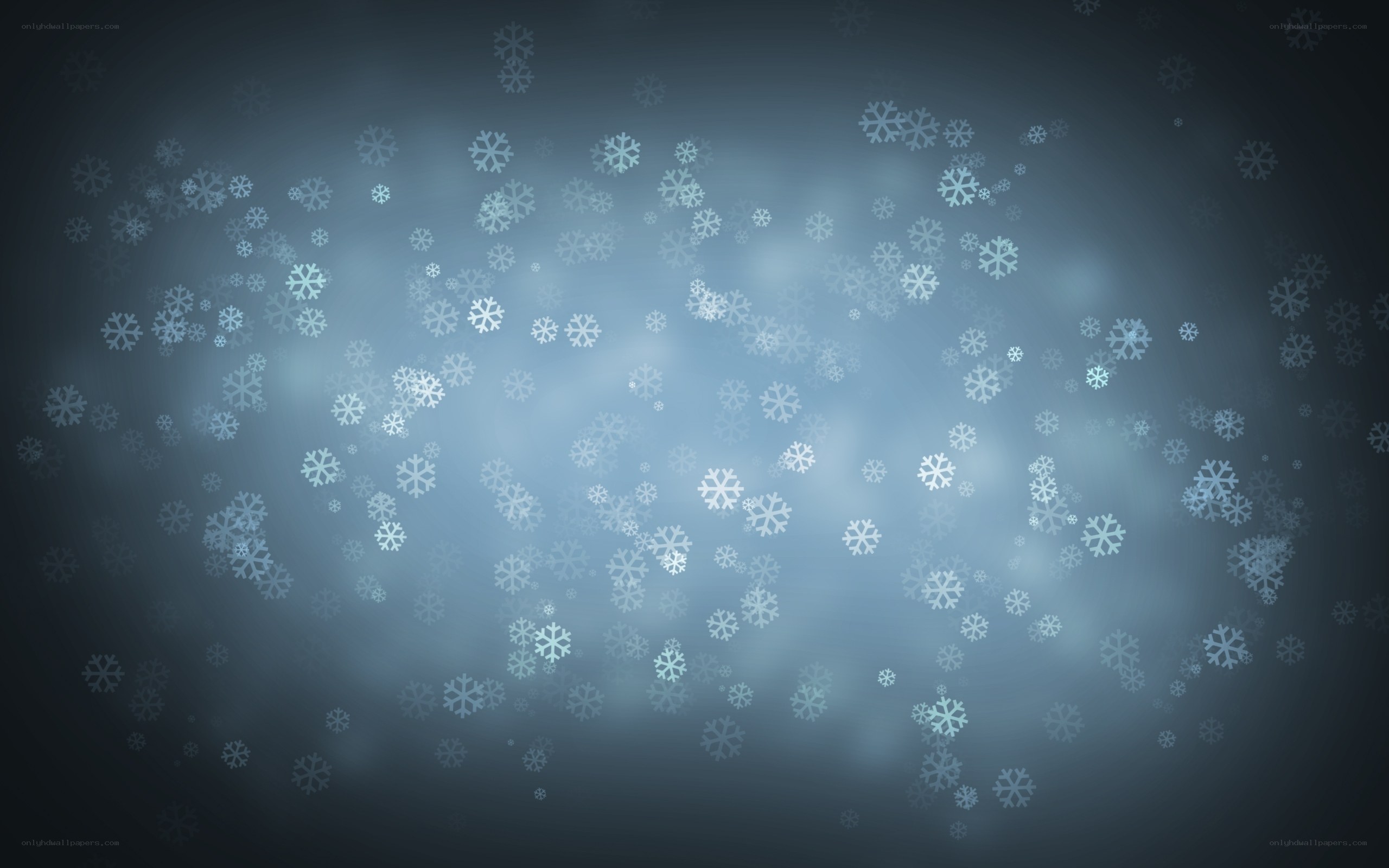 snowflakes falling in blue light