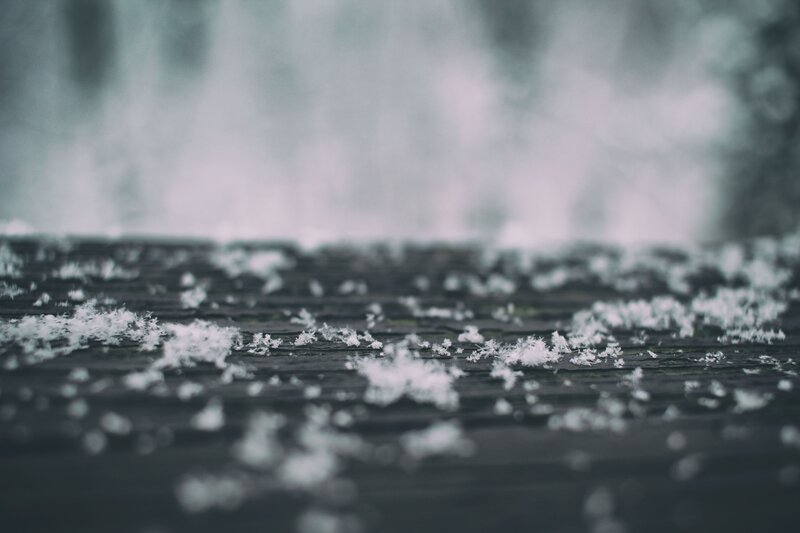 Snowflakes on Wooden Surface