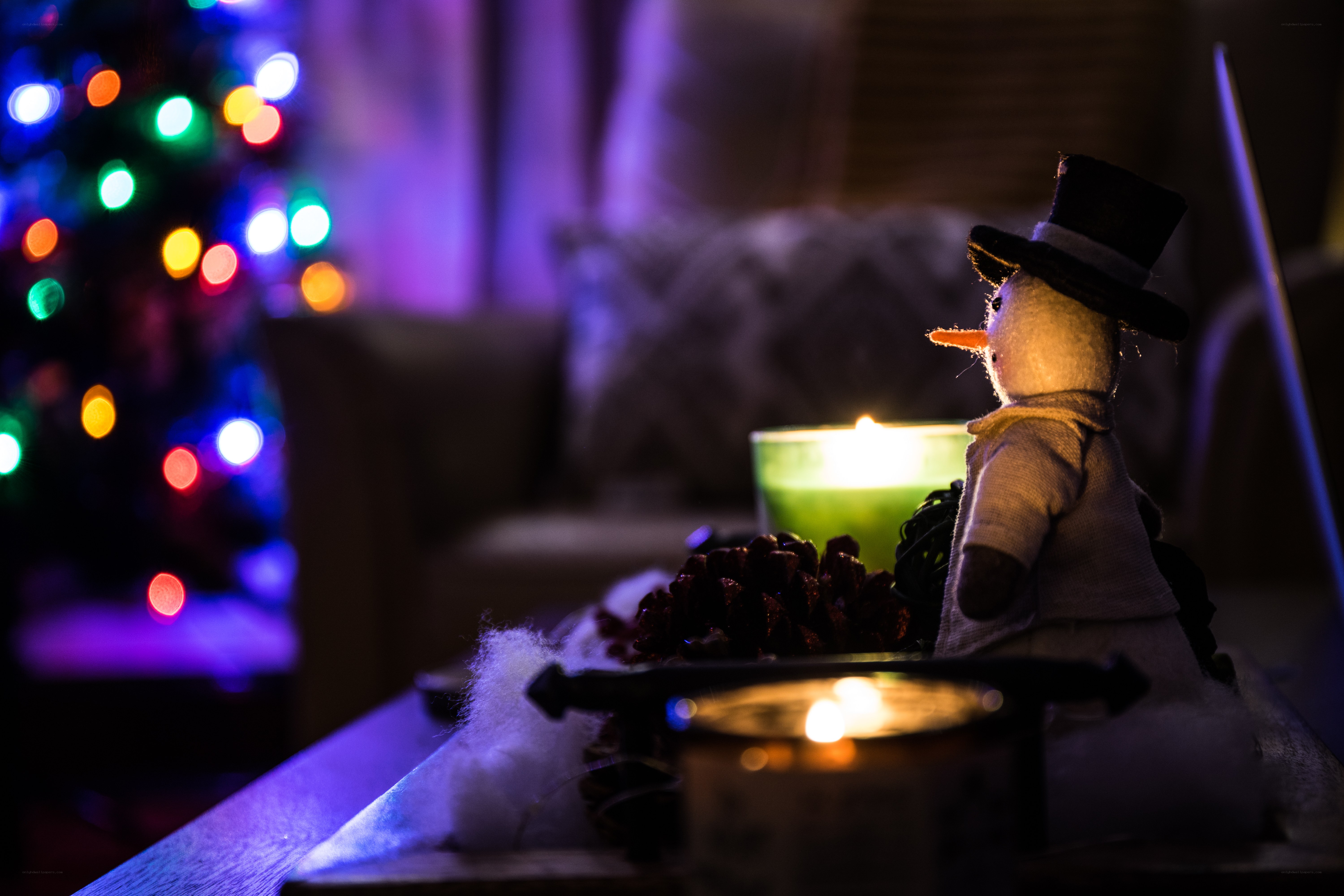 Snowman by candlelight