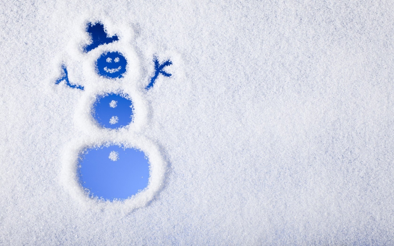 snowman drawn in snow
