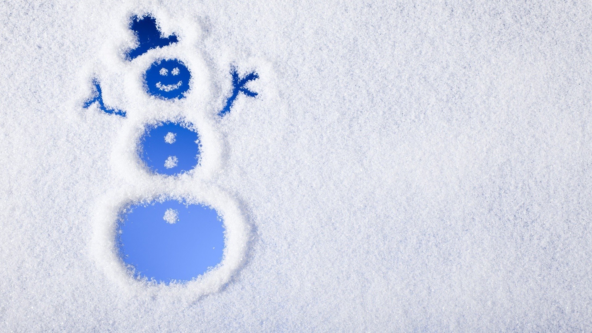 snowman drawn in snow