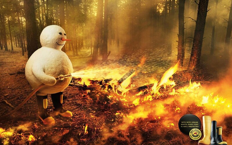 Snowman fighting forest fire