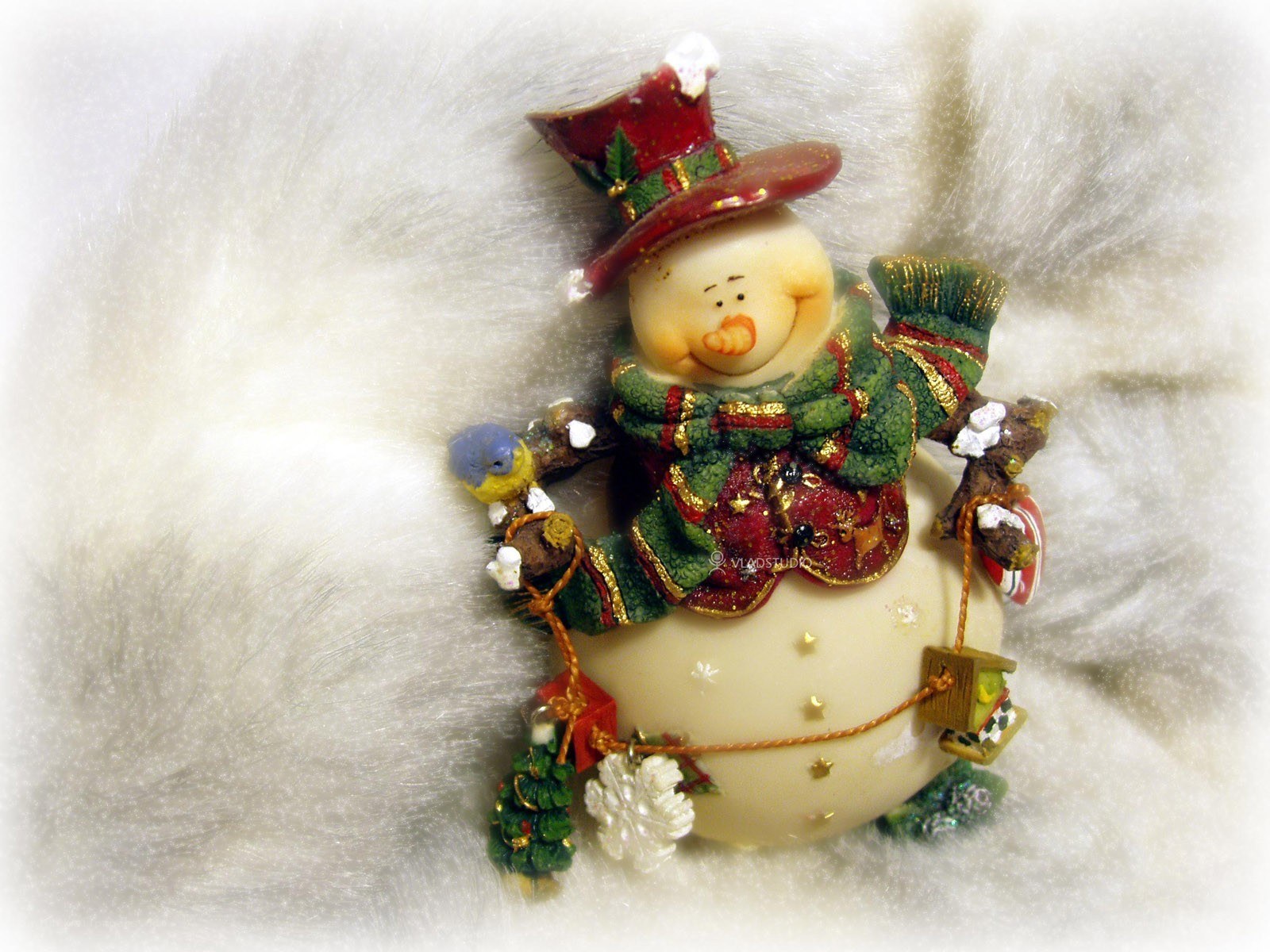 snowman figurine with bird