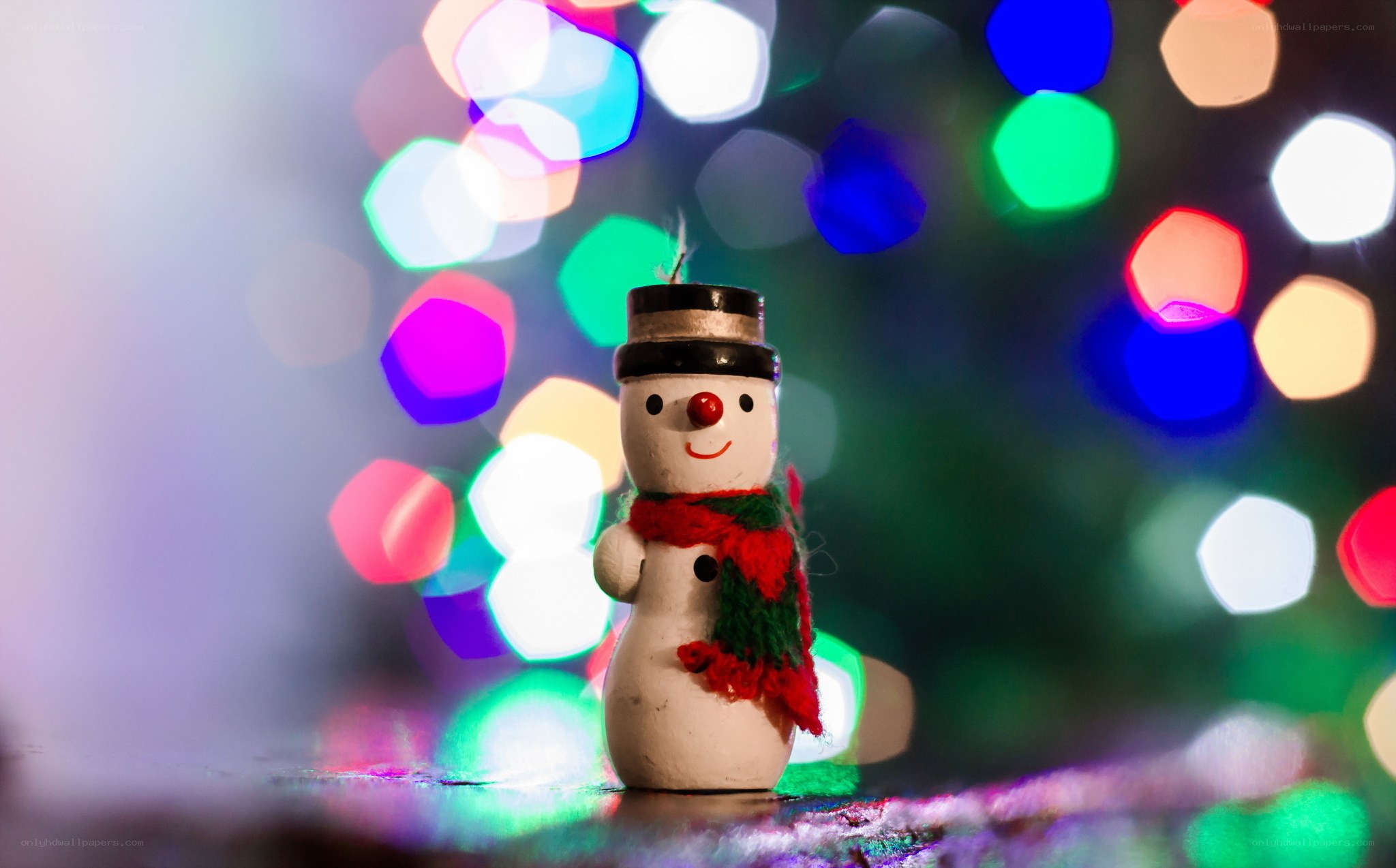 Snowman figurine with festive lights
