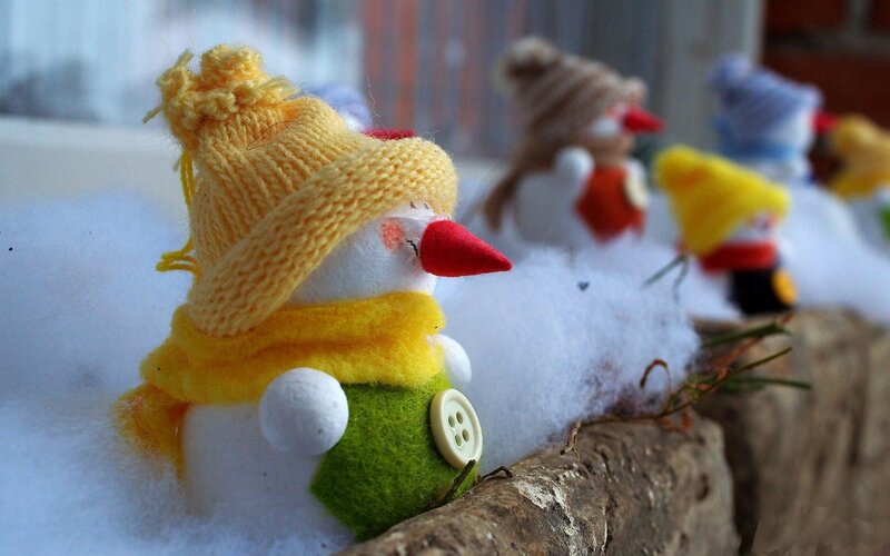 Snowman Figurines in Snow