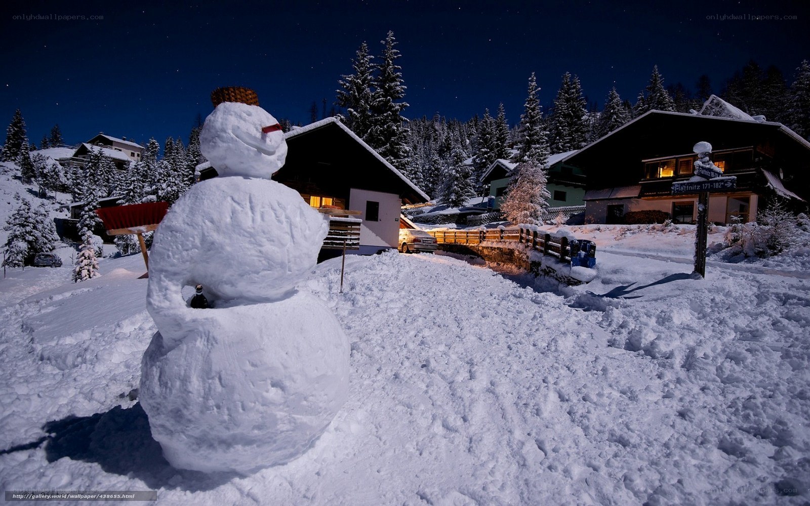 Snowman in a winter village
