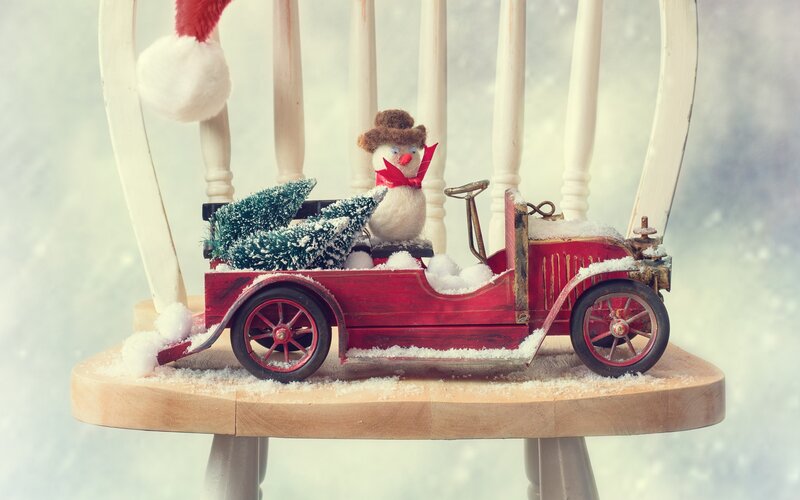 Snowman in Red Car