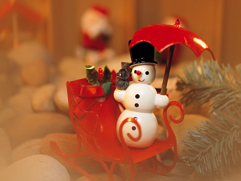 Snowman in Red Sleigh