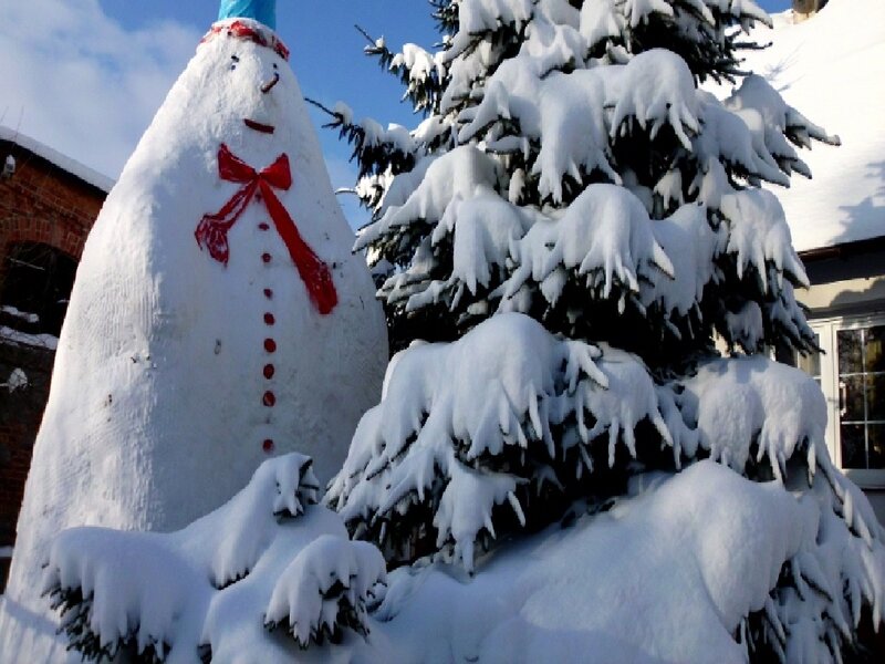 Snowman Next to Tree