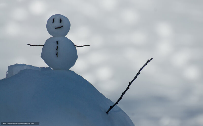 Snowman on a snowy hill