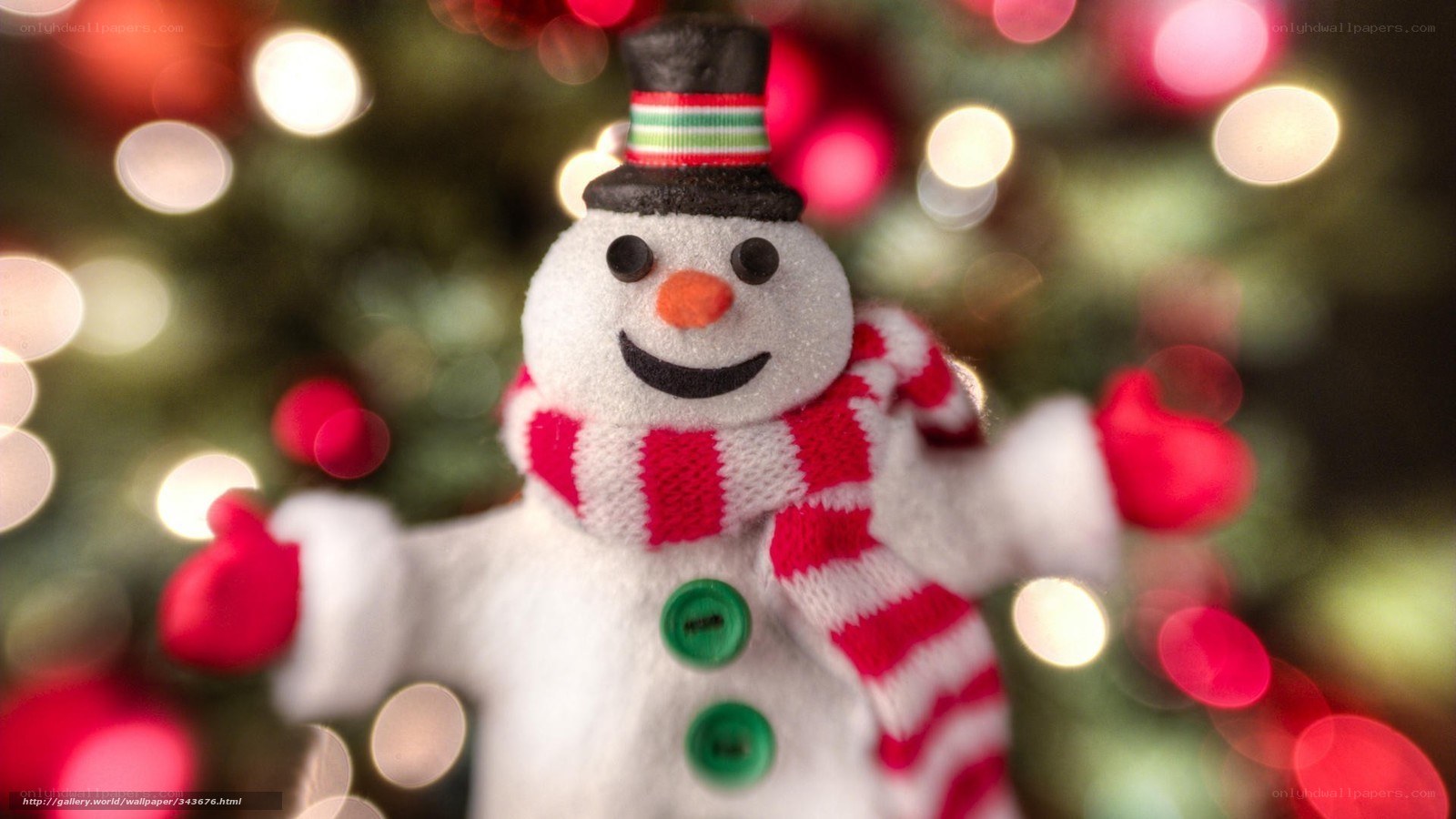 Snowman ornament on Christmas tree