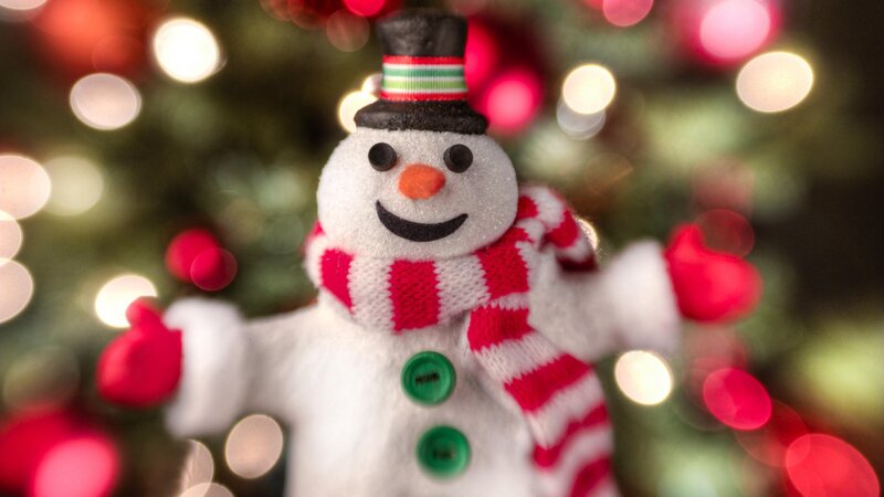 Snowman ornament on Christmas tree