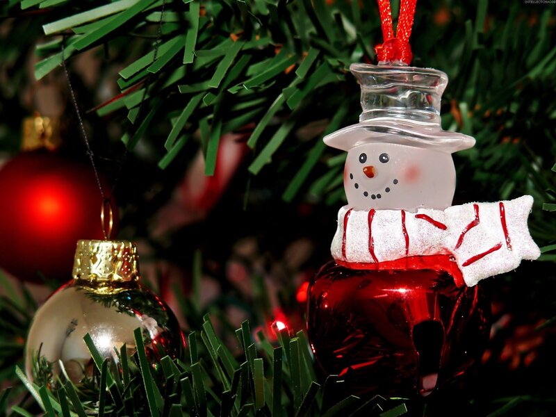 Snowman ornament on Christmas tree