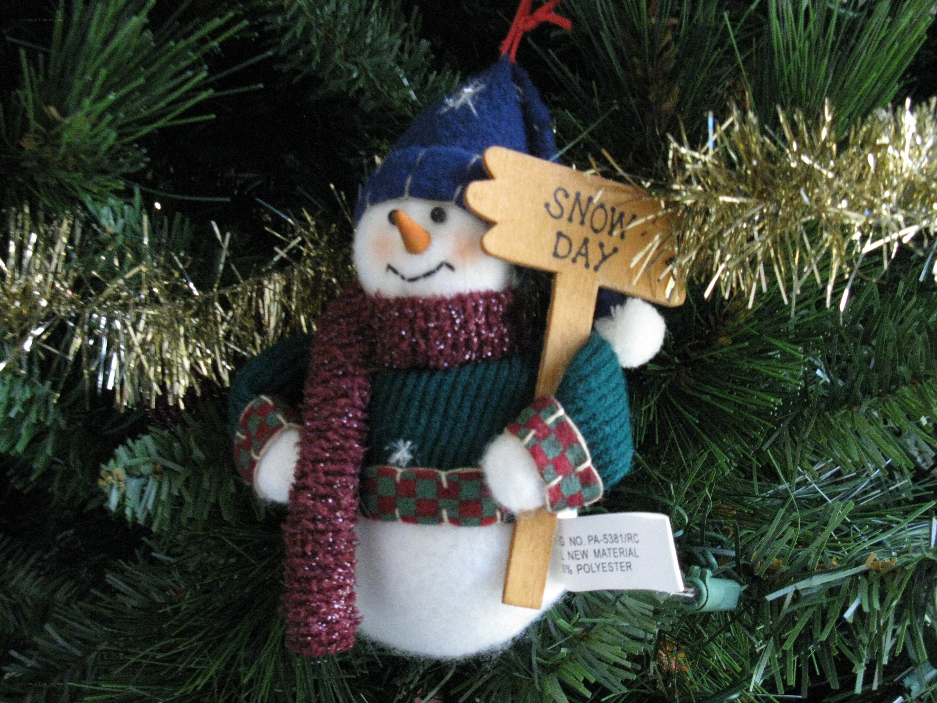 snowman ornament on tree