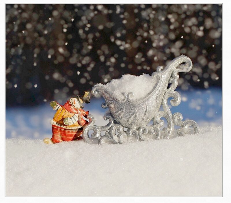 Snowman Pulling Sleigh