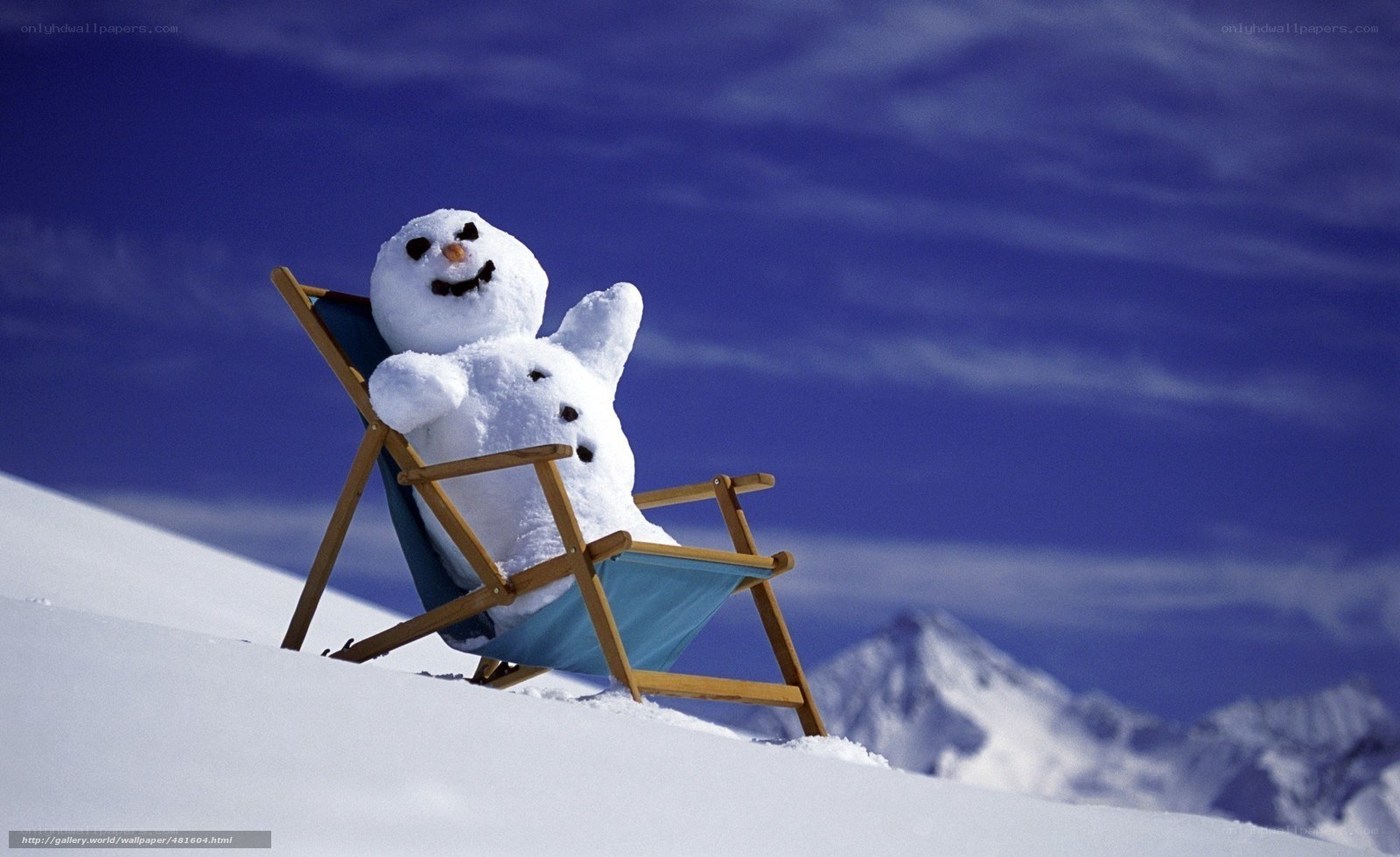 Snowman relaxing on a chair