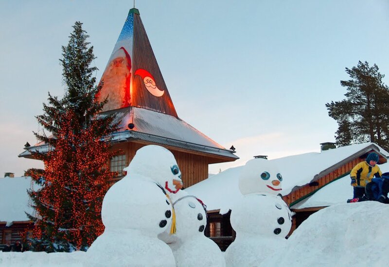Snowmen in Front of Building
