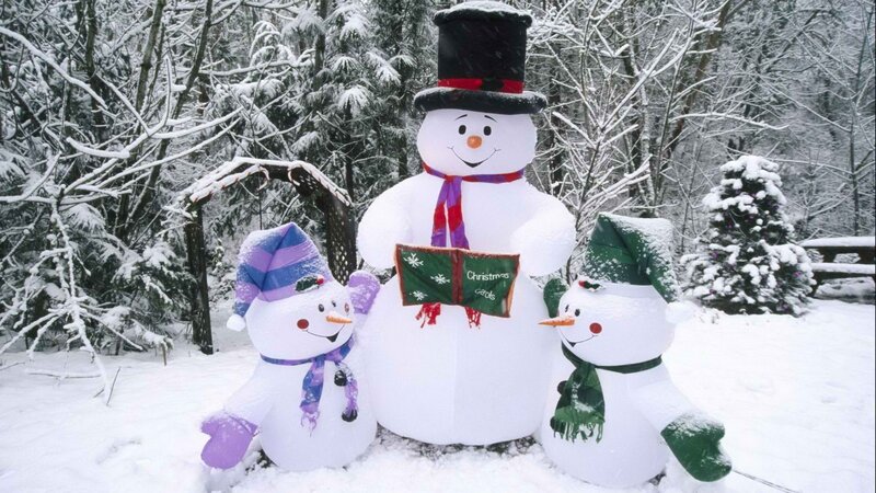Snowmen in snowy forest