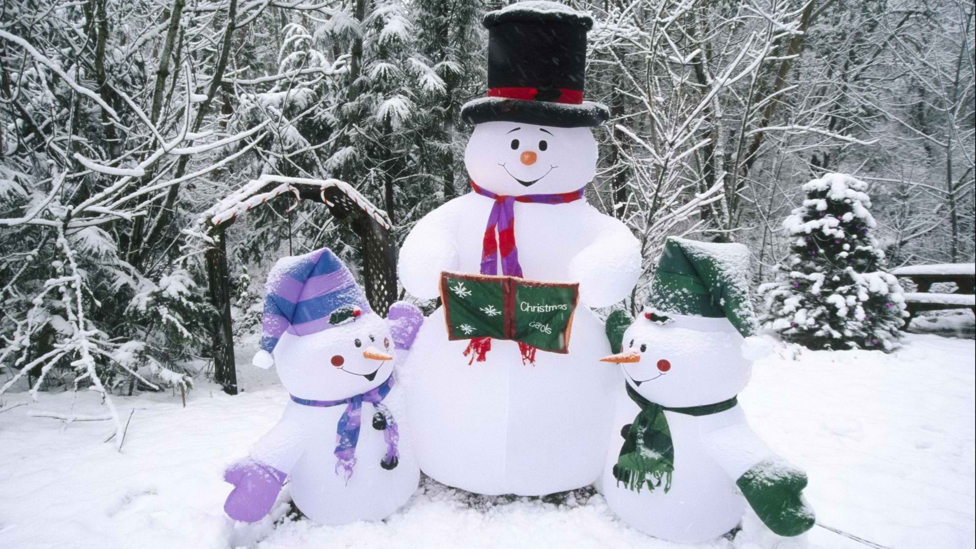 Snowmen in snowy forest