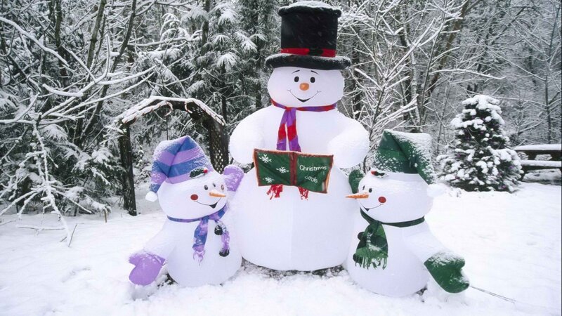 Snowmen in winter scene