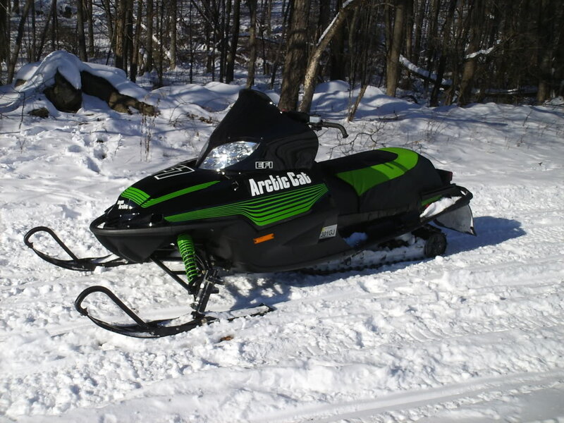 Snowmobile in Snow — Black