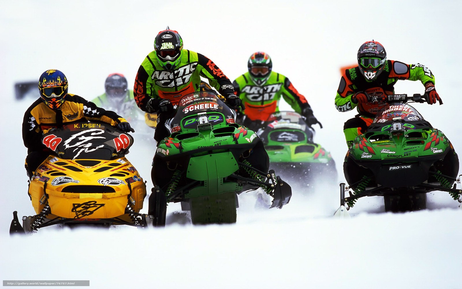 Snowmobile racers in action