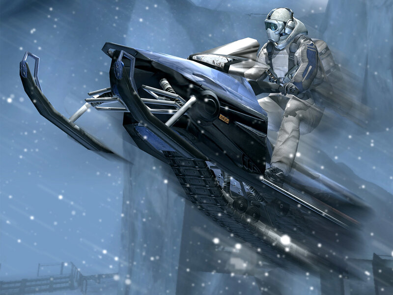 Snowmobile rider in snowy landscape