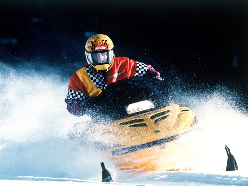 Snowmobiler in action