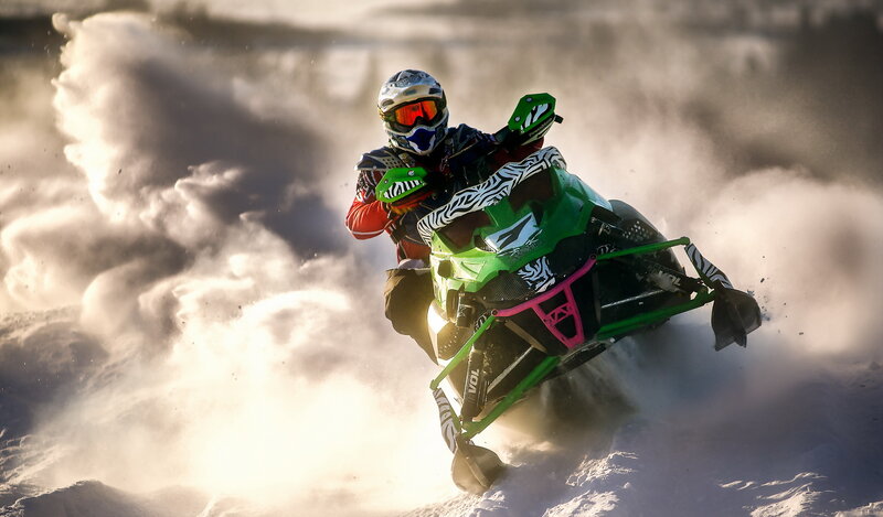 Snowmobiler in action