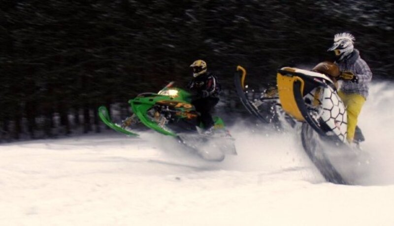 Snowmobiling in the forest