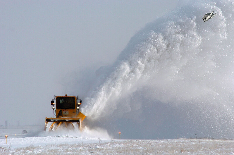 Snowplow clearing snow